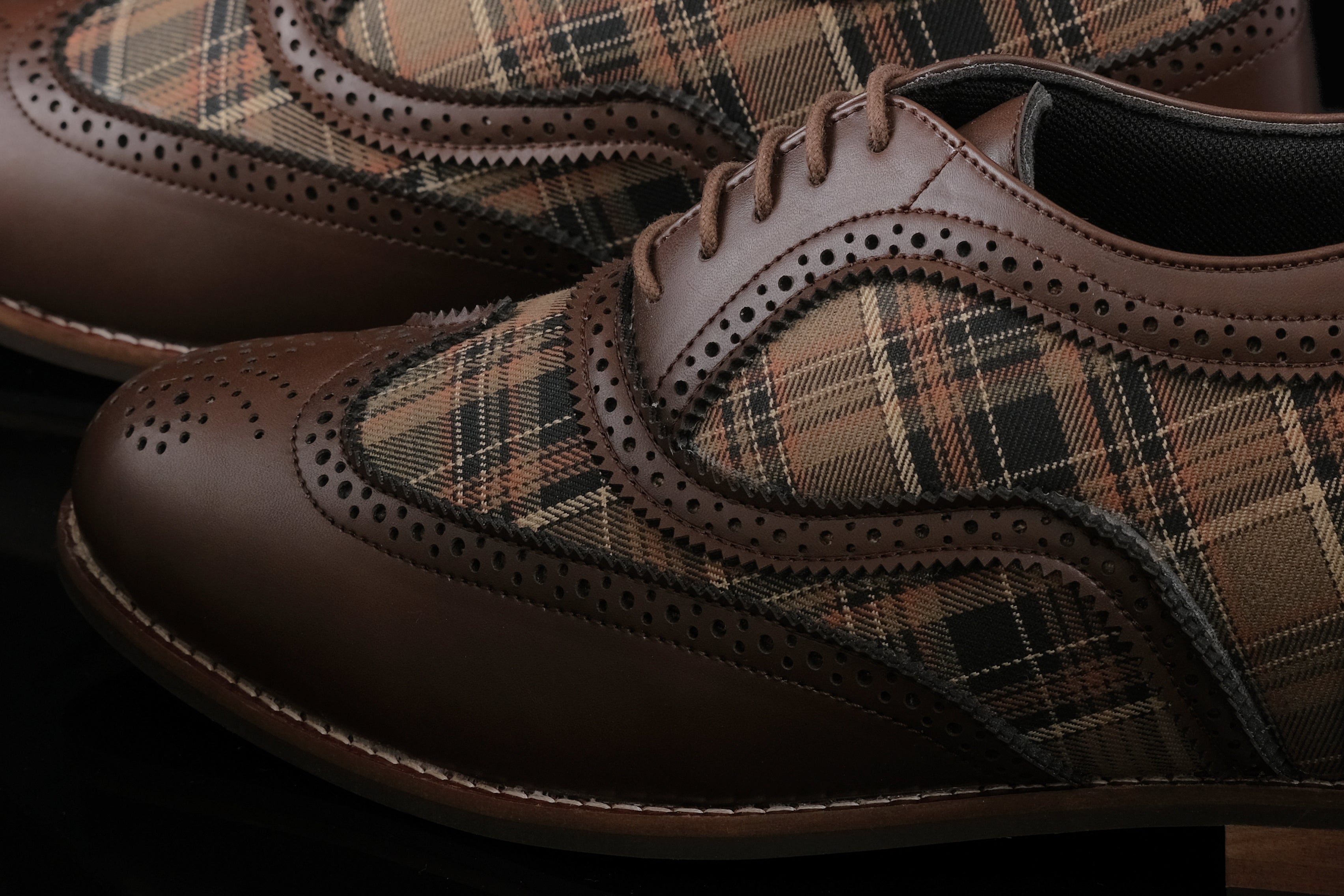 Edinburgh is a designer elevator brogue crafted with a discreet 2.5 inch hidden lift, combining textured textile detailing with classic brogue construction. Designed for weddings, formal dressing, and elevated smart casual wear, the silhouette balances timeless structure with handcrafted comfort and understated height enhancement.