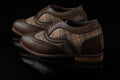 Edinburgh is a designer elevator brogue crafted with a discreet 2.5 inch hidden lift, combining textured textile detailing with classic brogue construction. Designed for weddings, formal dressing, and elevated smart casual wear, the silhouette balances timeless structure with handcrafted comfort and understated height enhancement.