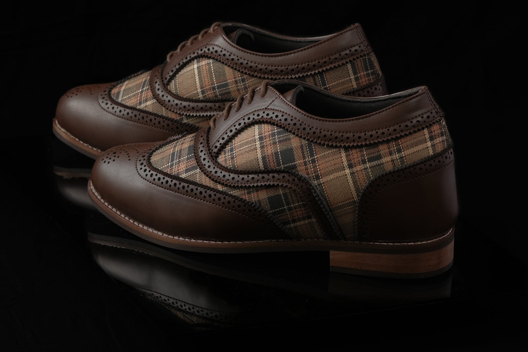 Edinburgh is a designer elevator brogue crafted with a discreet 2.5 inch hidden lift, combining textured textile detailing with classic brogue construction. Designed for weddings, formal dressing, and elevated smart casual wear, the silhouette balances timeless structure with handcrafted comfort and understated height enhancement.