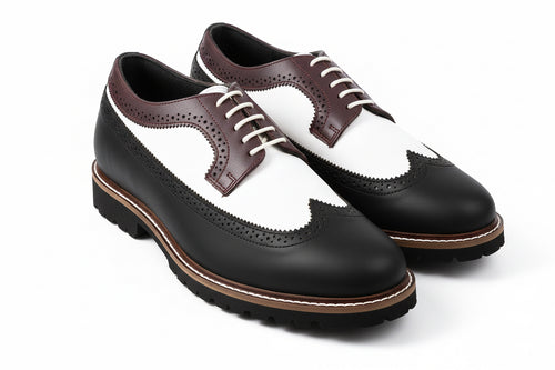 Gatsby is a designer elevator brogue crafted with a discreet 2.5 inch hidden lift, combining classic brogue construction with refined handcrafted detailing. Designed for weddings, formal occasions, evening wear, and elevated smart casual styling, the silhouette delivers understated height enhancement with timeless sophistication and comfort.