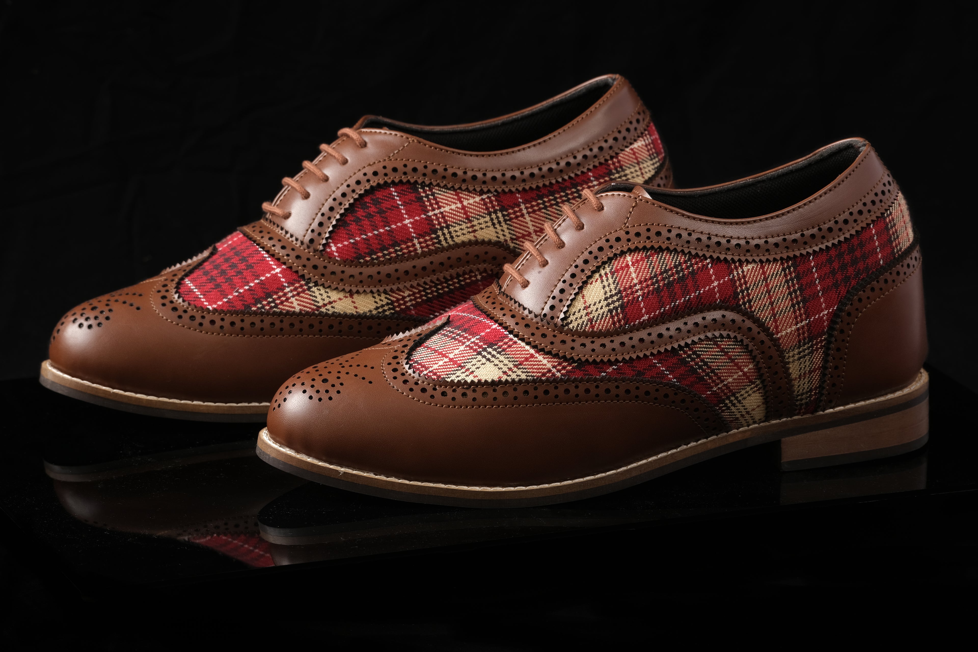 Glasgow is a designer elevator brogue crafted with a discreet 2.5 inch hidden lift, combining modern brogue construction with textured handcrafted detailing. Designed for evening wear, formal dressing, smart casual styling, and elevated everyday use, the silhouette delivers understated height enhancement with timeless structure and comfort.
