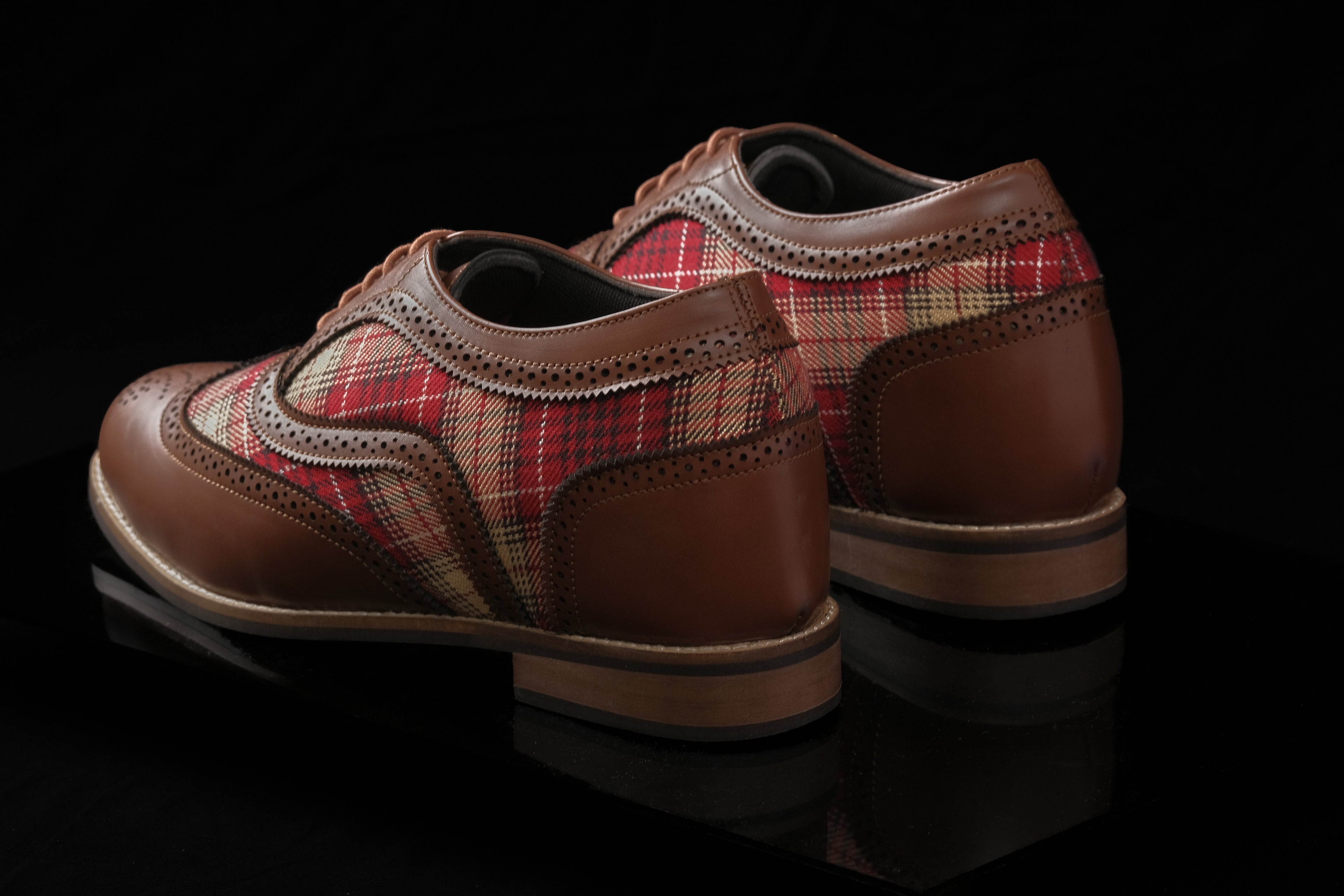 Glasgow is a designer elevator brogue crafted with a discreet 2.5 inch hidden lift, combining modern brogue construction with textured handcrafted detailing. Designed for evening wear, formal dressing, smart casual styling, and elevated everyday use, the silhouette delivers understated height enhancement with timeless structure and comfort.