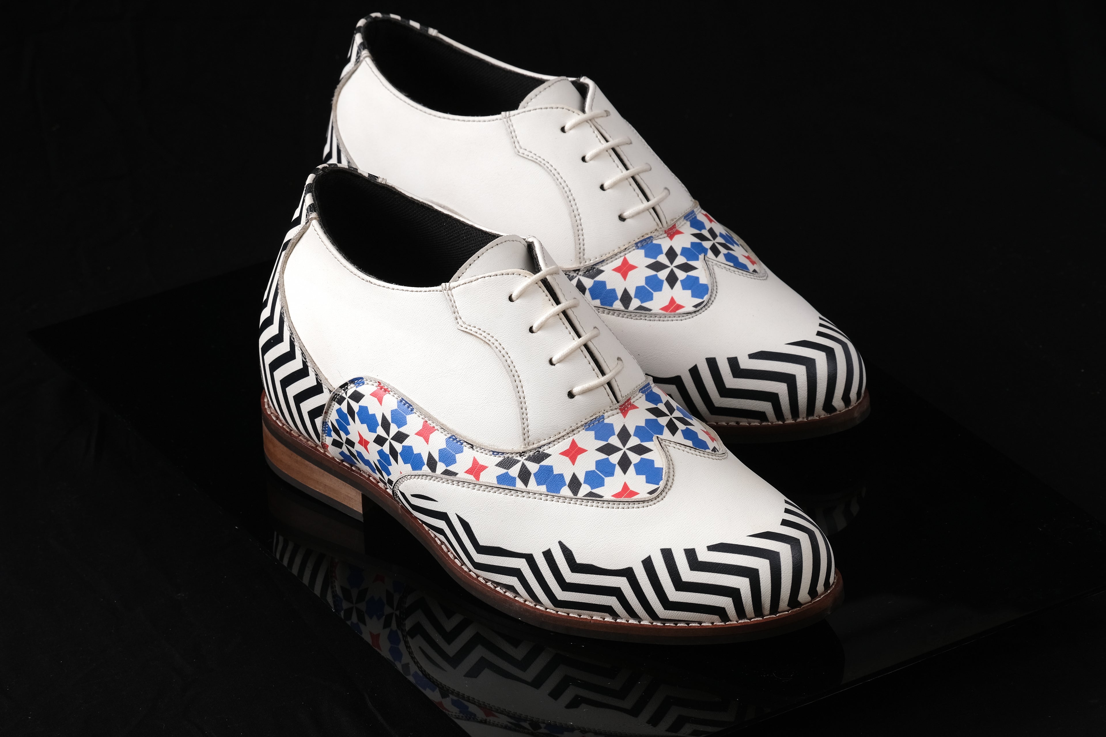 Udaipur is a designer elevator brogue crafted with a discreet 2.5 inch hidden lift, combining textured textile detailing with classic handcrafted construction. Designed for weddings, celebrations, formal dressing, and elevated smart casual wear, the silhouette blends timeless brogue structure with understated height enhancement and everyday comfort.